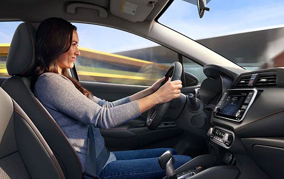 2022 Nissan Versa showing luxurious leather front seats | Marshall Nissan in Salina KS