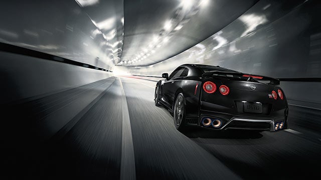 2023 Nissan GT-R seen from behind driving through a tunnel | Marshall Nissan in Salina KS